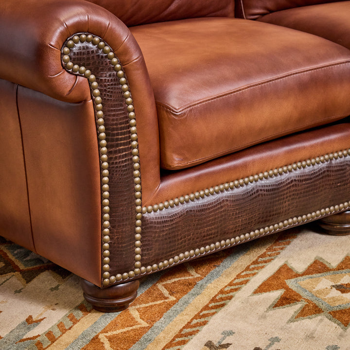 Kayhill Wagon Wheel Curved Leather Sofa