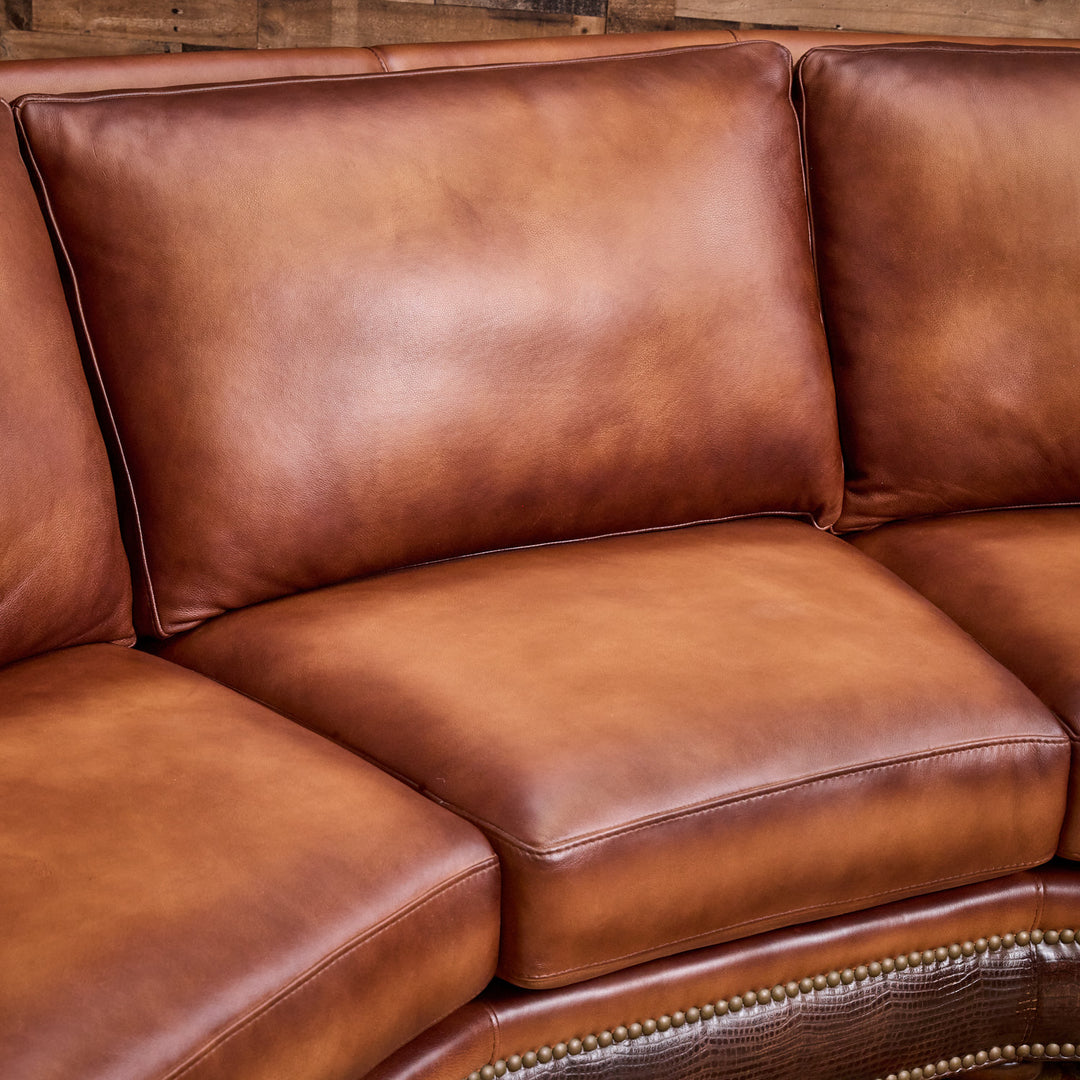 Kayhill Wagon Wheel Curved Leather Sofa