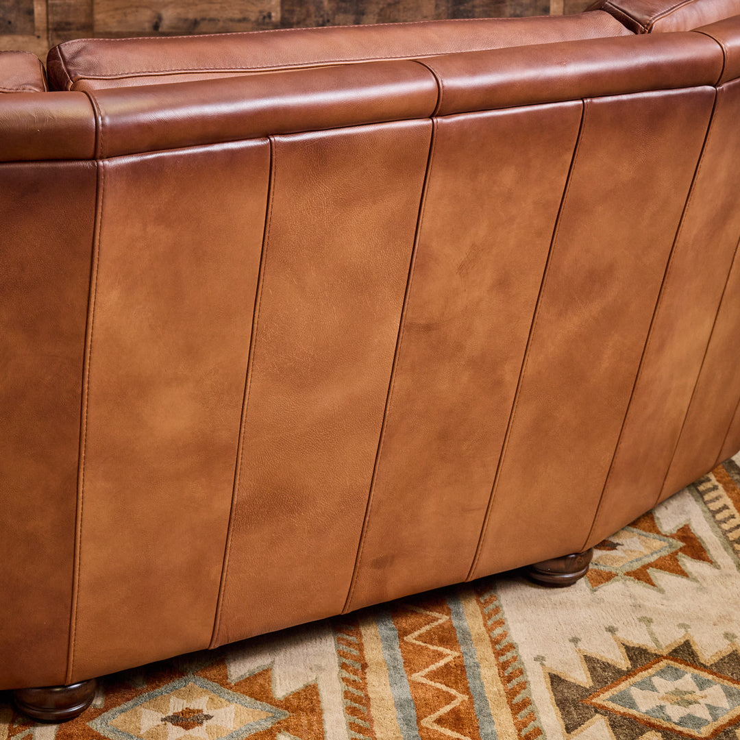 Kayhill Wagon Wheel Curved Leather Sofa