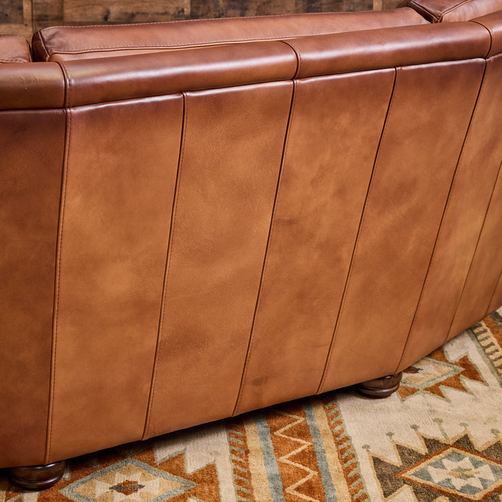 Kayhill Wagon Wheel Curved Leather Sofa