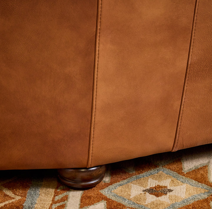 Kayhill Wagon Wheel Curved Leather Sofa