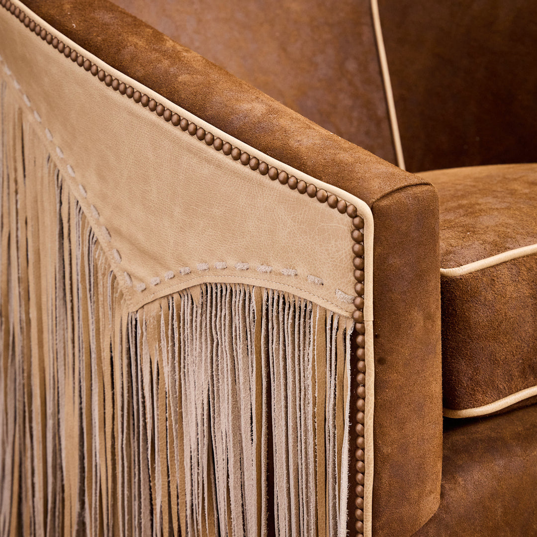 Rusty Rose Fringe Swivel Chair