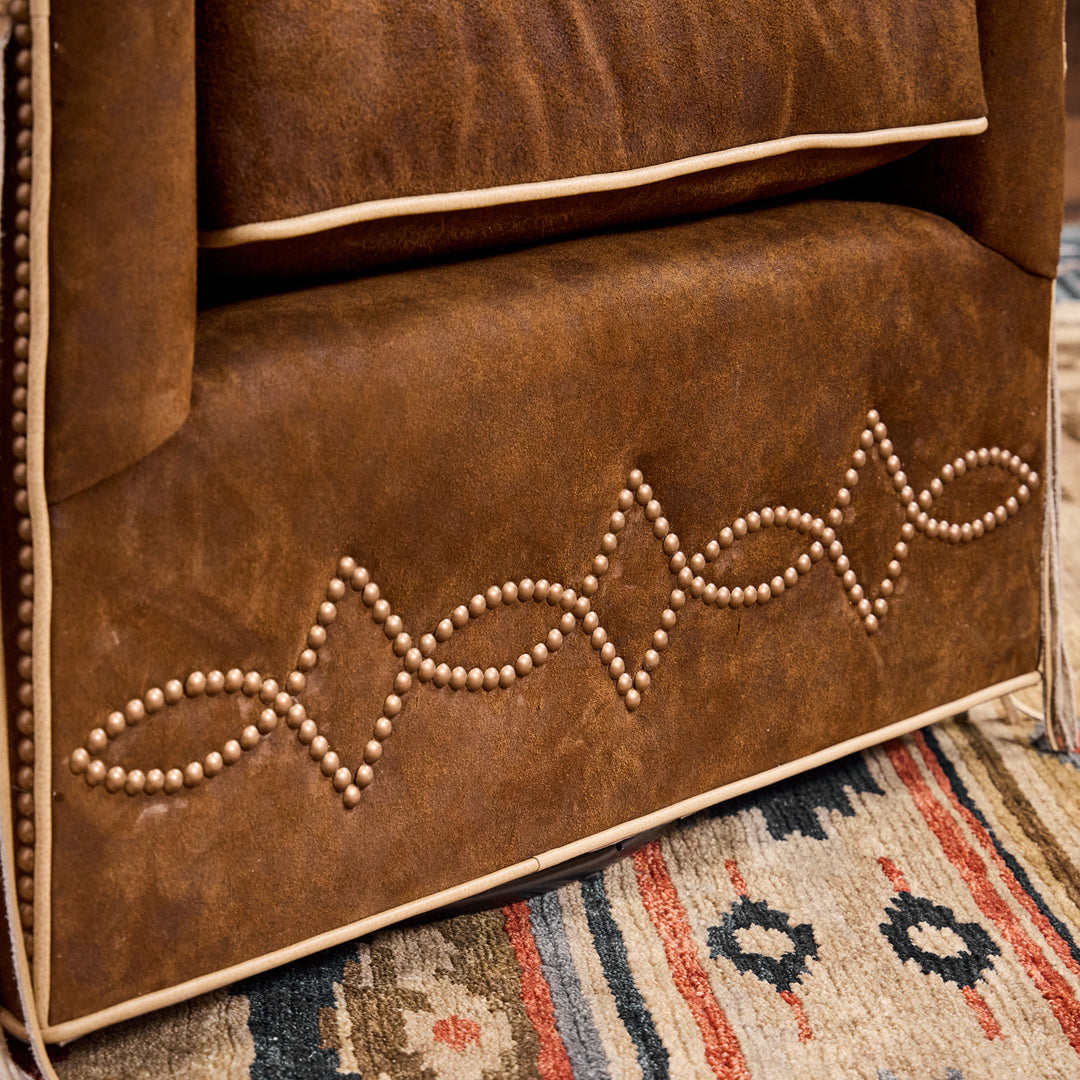 Rusty Rose Fringe Swivel Chair