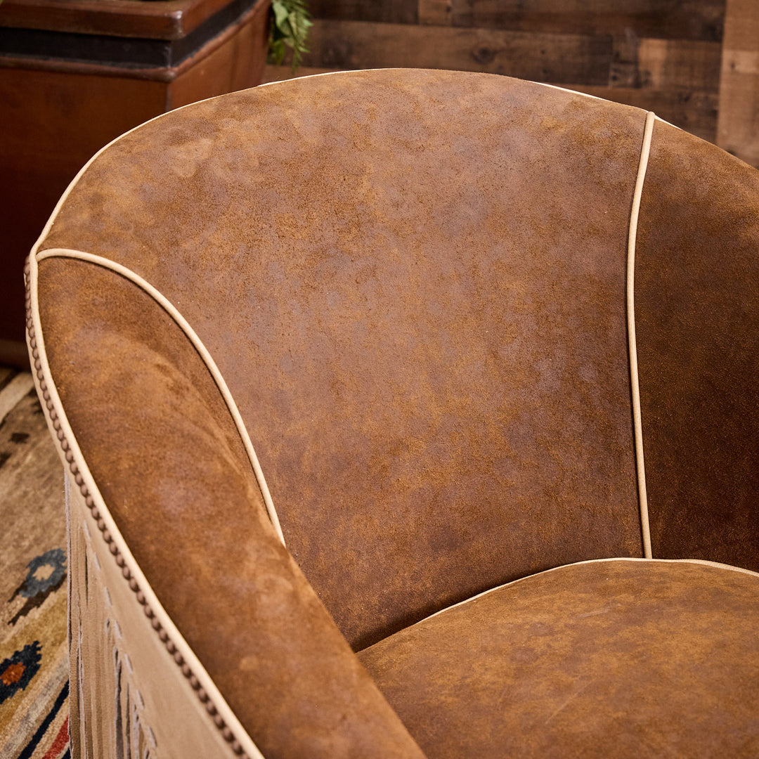 Rusty Rose Fringe Swivel Chair