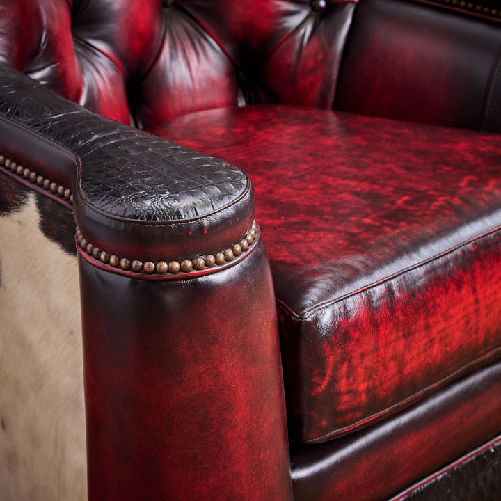 Kingsville Cowhide and Antique Red Swivel Glider Chair