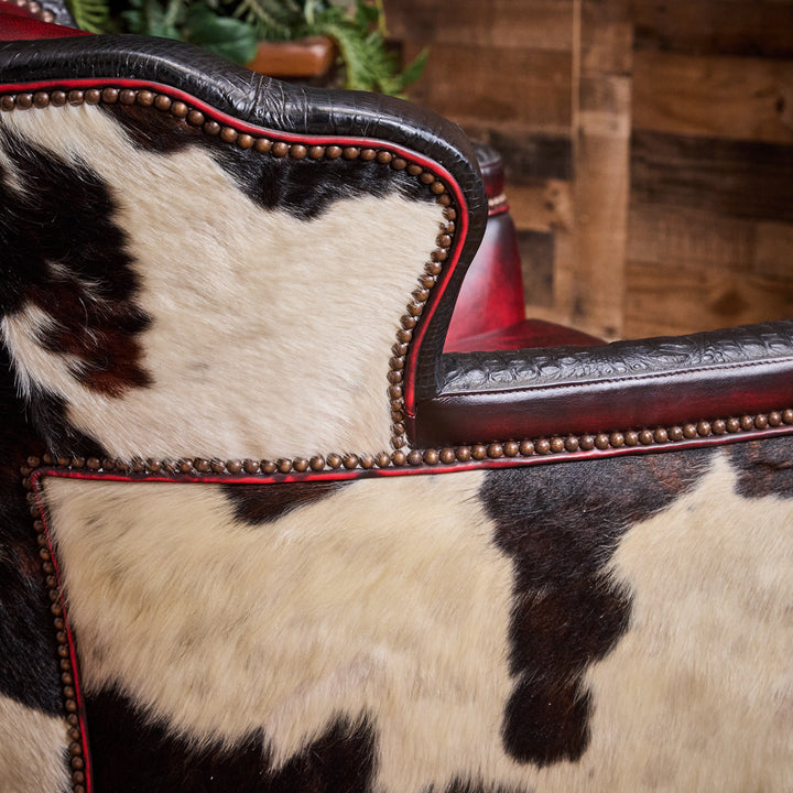 Kingsville Cowhide and Antique Red Swivel Glider Chair