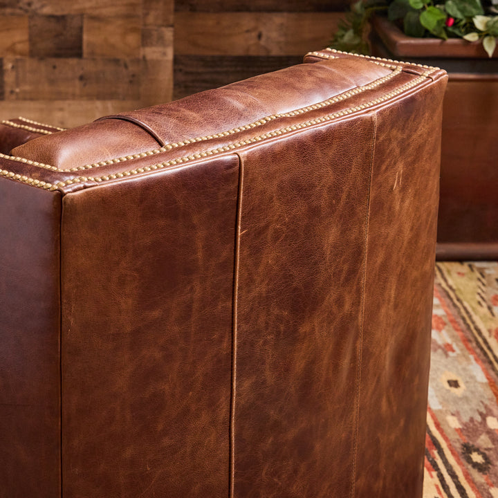 Adler Tufted Leather Swivel Chair
